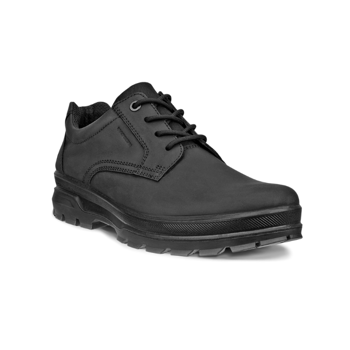 Black leather shoe with detailed stitching, black laces and black lugged outsole.