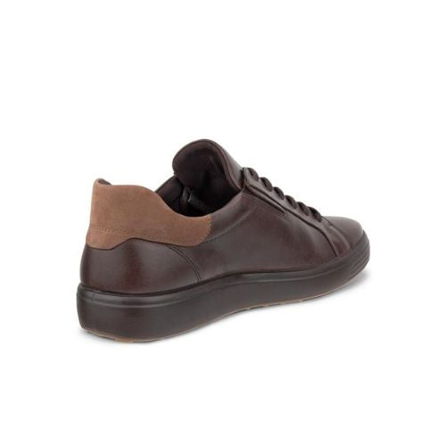 Heel view of brown leather sneaker with brown laces, light brown accent on heel and brown rubber outsole.
