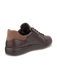 Heel view of brown leather sneaker with brown laces, light brown accent on heel and brown rubber outsole.