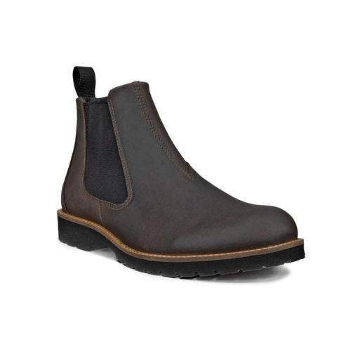 Dark clay leather chelsea boot with side goring, heel pull tab and a black lugged outsole.