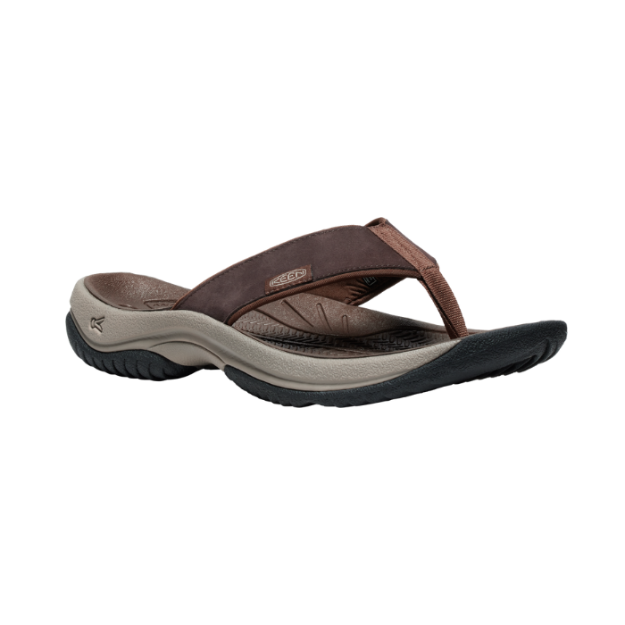 Brown thong sandal with black rugged outsole. 