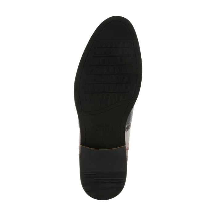 Black light treaded dress shoe outsole.