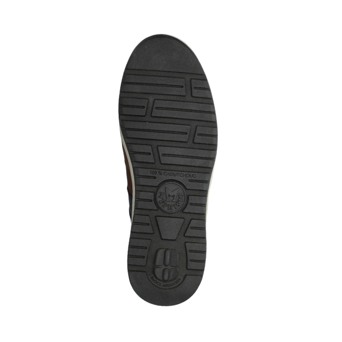 Black light treaded sneaker outsole with Mephisto logo in middle.