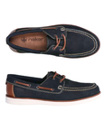 Pair of Navy blue boat shoes with brown lacing, accent stitching, tan Rieker logo'd footbed and white outsole.
