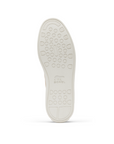 White light treaded outsole with circle design and Sorel logo in middle.