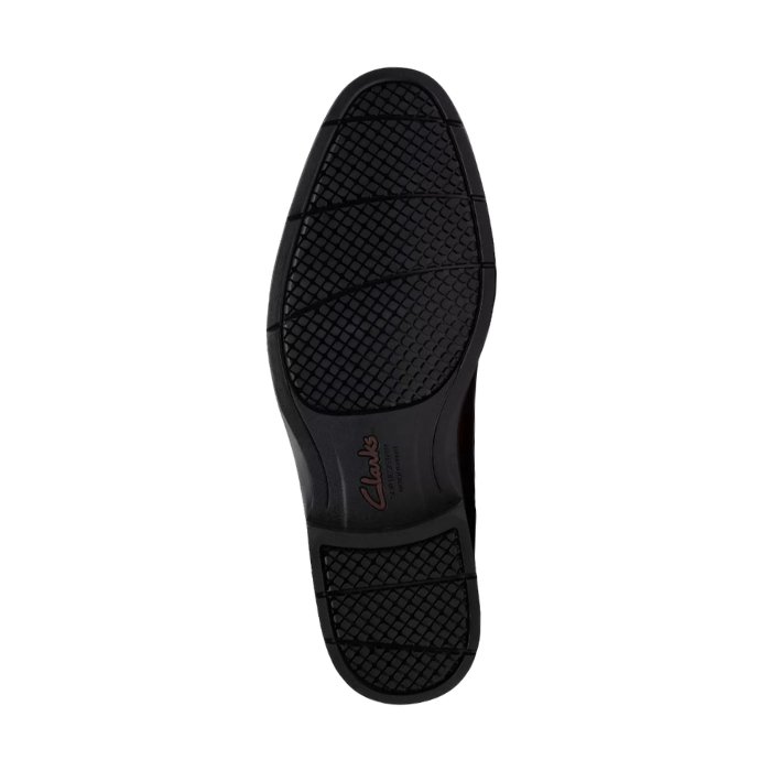 Black light treaded outsole of a dress shoe.