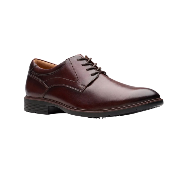 Dark Brown leather derby dress shoe with stitching details and low heel. 