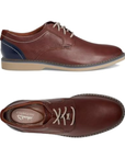Pair of Brown leather derby dress shoes with navy heel accent, beige laces, tan Clarks logo'd footbed and beige outsole.