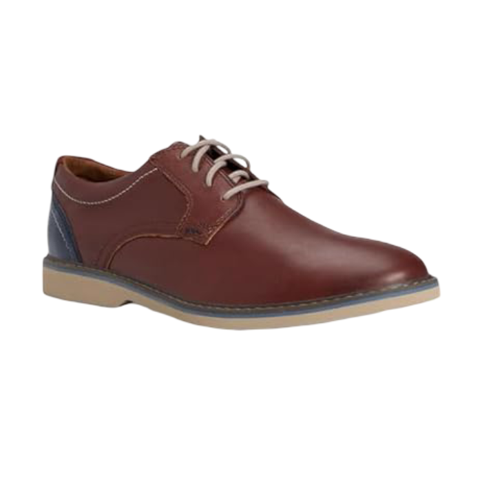 Brown leather derby dress shoe with navy heel accent, beige laces and beige outsole.