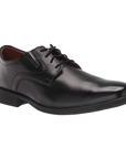 Black leather derby dress shoe with stitching details and low heel. 
