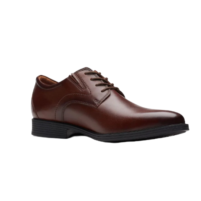 Brown Mahogany leather derby dress shoe with stitching details and low heel. 