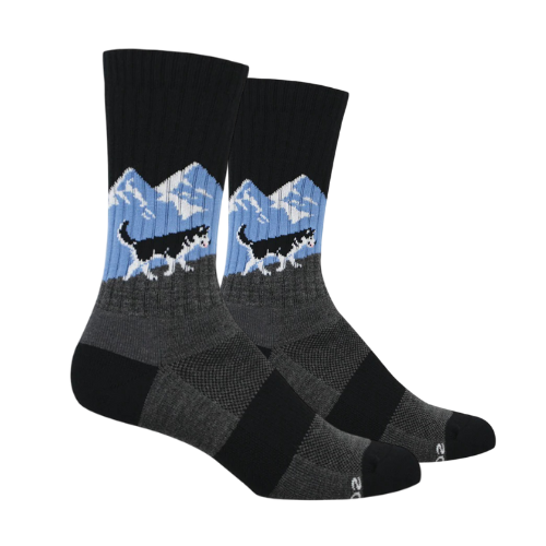 Black and grey socks with husky walking by a snowy mountain pattern.