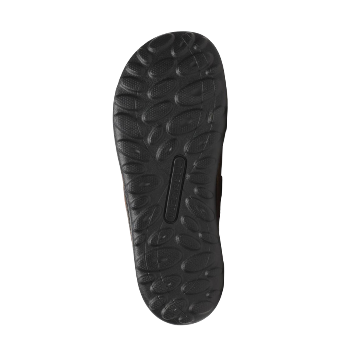 Black light treaded outsole with circle pattern and Merrell logo in middle.