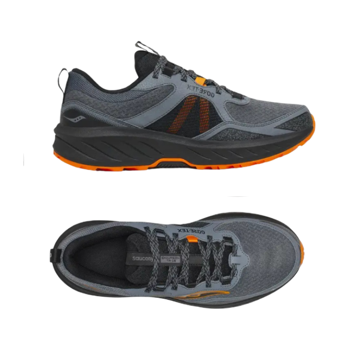 Pair of Grey mesh hiking sneakers with orange accents, black footbed, black thick midsole and orange outsole.