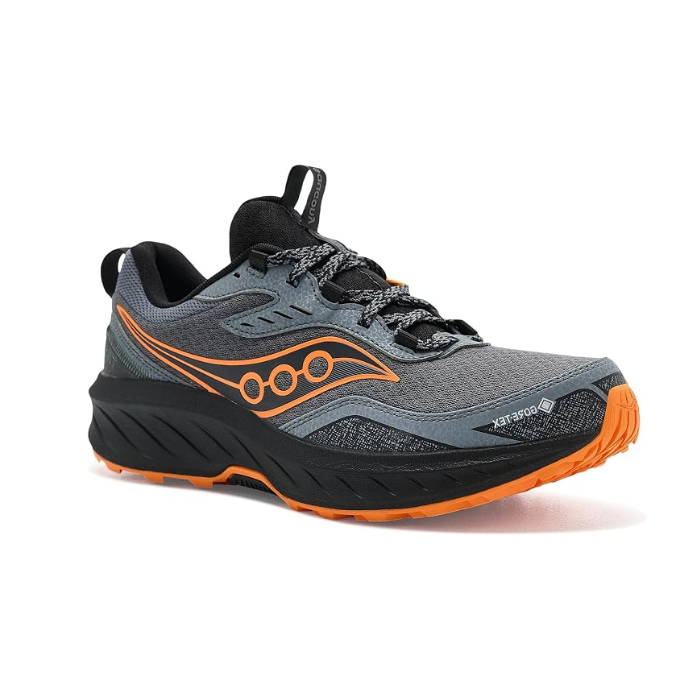 Grey mesh hiking sneaker with orange Saucony logo on side, black thick midsole and orange outsole.