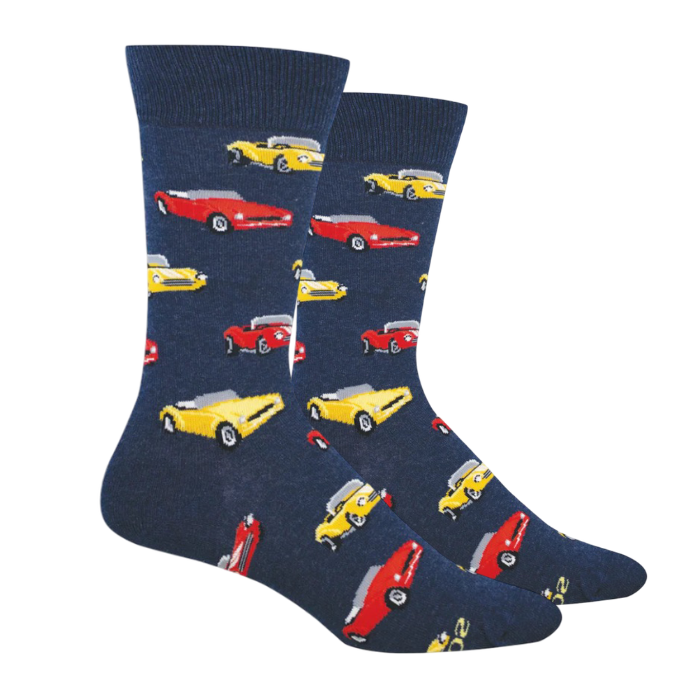 A pair of navy blue crew socks with an all-over pattern of classic sports cars in red and yellow.