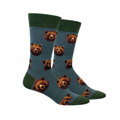 Pair of blue socks with grizzly bear face pattern and green cuff, toe and heel cap.