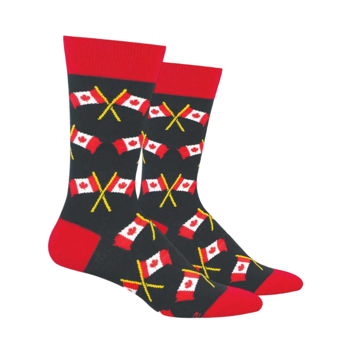 Black mens crew socks with red cuff, heel and toe cap with Canada flags on yellow crossed poles pattern.