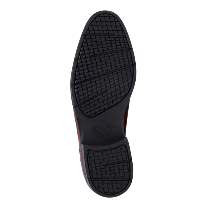 Black light treaded outsole with Clarks logo stamped in middle.