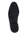 Black light treaded outsole with Clarks logo stamped in middle.