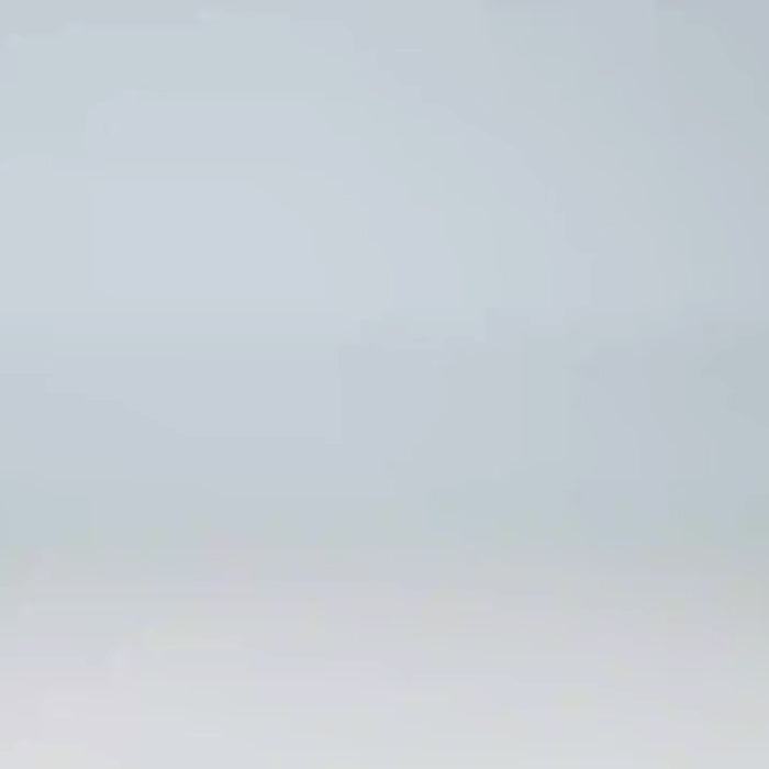 Video showing Black knee high boots worn with grey pants.