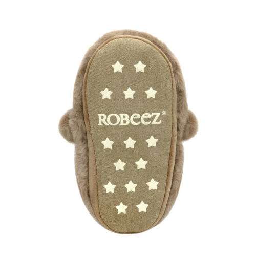 Beige suede outsole of slipper with star patterns and 'ROBEEZ' branding.