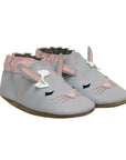 Pair of grey and pink leather Bunny baby shoes with 3D ears, bow, sleepy eyes over heart shaped nose and gold whiskers.