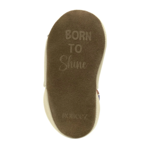 Brown suede outsole with 'Born to Shine' text.