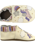 Pair of baby's ivory leather shoes with shooting star, unicorns in the sky pattern and striped cinched cuff.