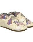 Pair of baby's ivory leather shoes with shooting star, unicorns in the sky pattern and striped cinched cuff.