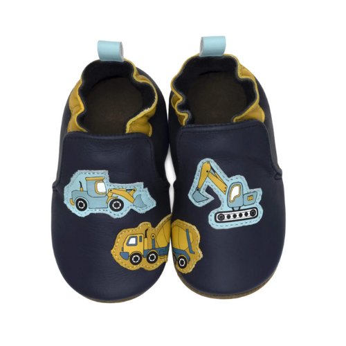 Top view of navy blue baby shoes with yellow accents and construction vehicle's on toe, cinched cuff and blue pull tab.