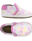 Pair of baby's shoes with purple, pink, green and yellow butterfly pattern and tan footbed.