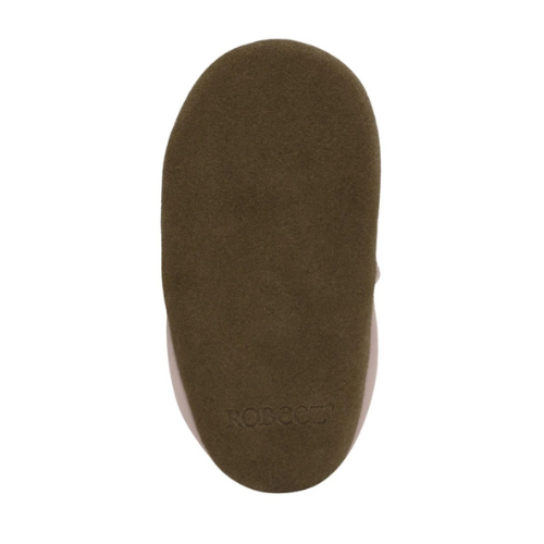 Brown suede outsole of baby shoe with Robeez logo on heel.