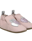 Pair of pink baby shoes with glittery hearts and cinched cuff. 