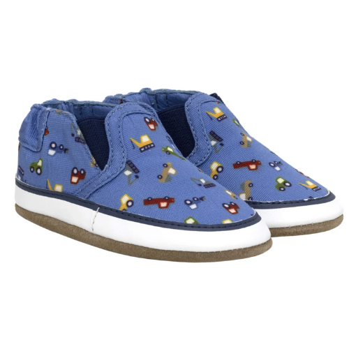 Blue canvas baby's shoes with vehicle pattern, white midsole and tan suede outsole.