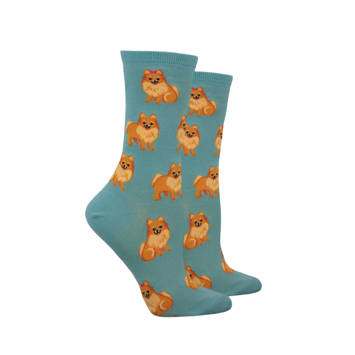 Blue crew socks with brown Pomeranians sitting and standing.