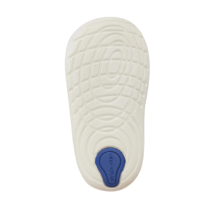 White flexible outsole with blue Stride rite logo on heel.
