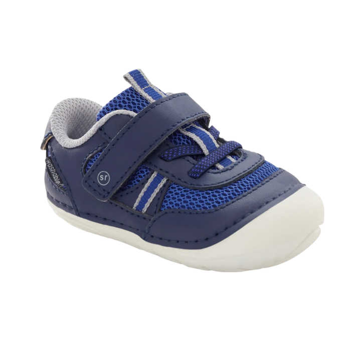 Navy and blue toddler shoe with Velcro strap, grey accents and white soft motion outsole.