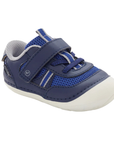 Navy and blue toddler shoe with Velcro strap, grey accents and white soft motion outsole.