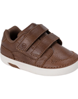 Brown children's shoe with two Velcro straps and white soft motion outsole.