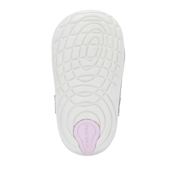 White Soft Motion treaded outsole with pink Stride Rite logo on heel.