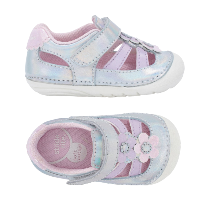 Pair of toddler fisherman sandals with iridescent pastel blue and pink synthetic leather, a hook-and-loop strap, a decorative flower applique up vamp, pink Stride Rite logo'd footbed and a white outsole.