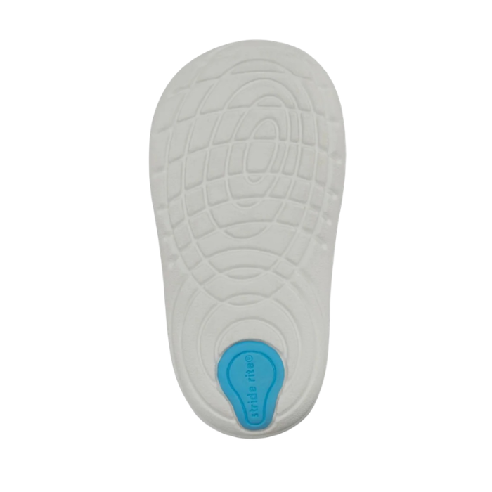 White soft Notion outsole with blue Stride Rite logo on heel.