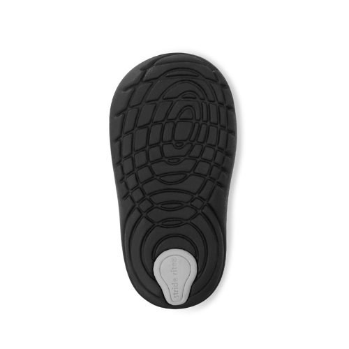 Black Soft Motion treaded outsole with grey Stride Rite logo on heel.