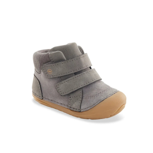A grey high-top baby bootie with a grey knit ankle collar, two wide  hook-and-loop straps and crepe coloured outsole.