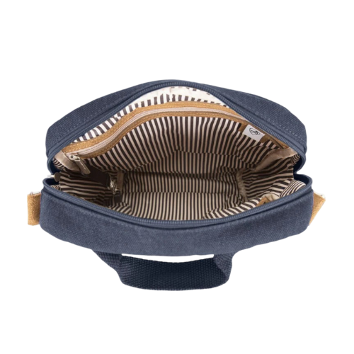 Open navy bag with striped interior and tan suede accents.