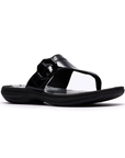 Black patent thong sandal with a black octagonal buckle, floral white footbed and black outsole.