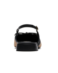 Heel of Pointed-toe slingback flat with bow detail, cheetah print upper and a low block heel.