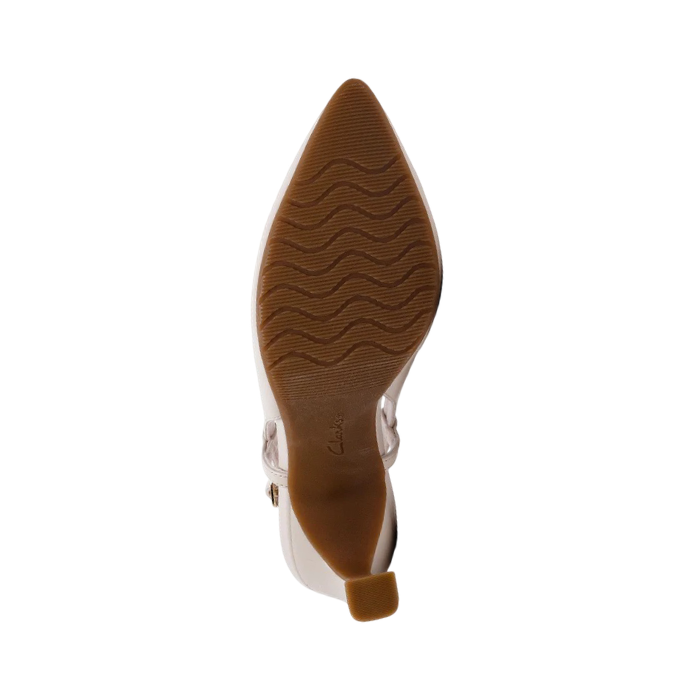 Pointed toe outsole with light wave pattern tread and Clarks logo stamped in middle.