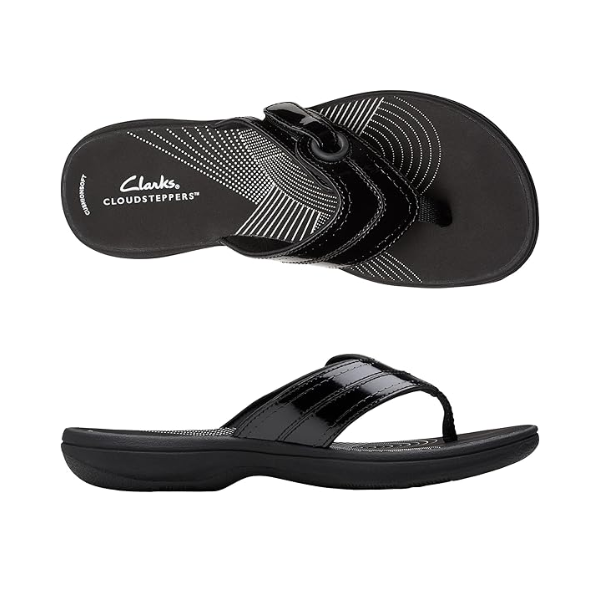 Top and side views of Clarks Breeze Reyna sandal in black, showing the cushioned EVA footbed and stylish stitching details.